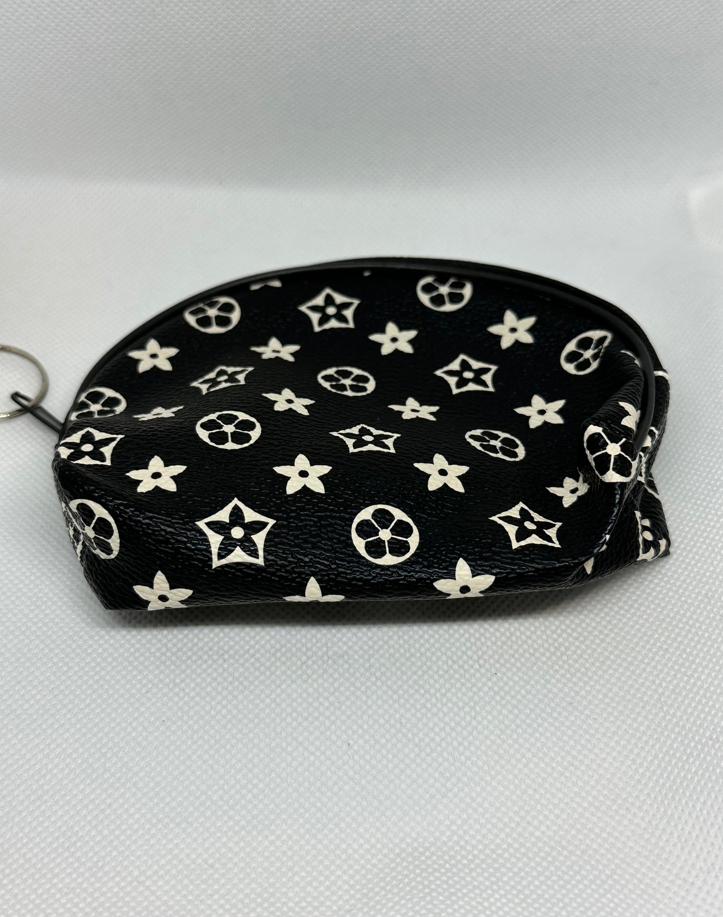 Coin inspired pouch