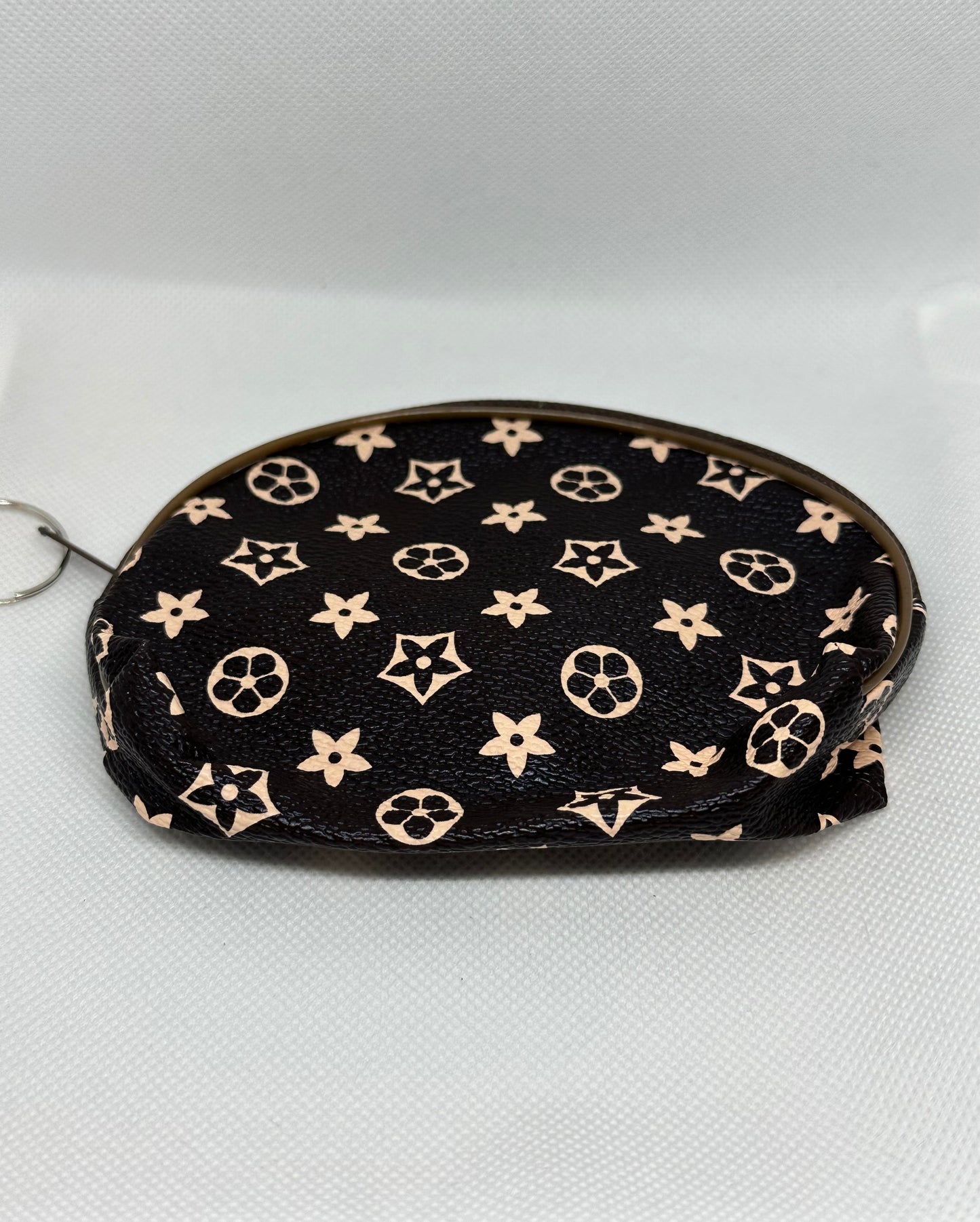Coin inspired pouch