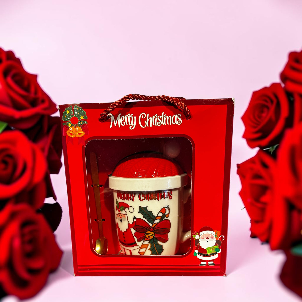 Merry Christmas mug with lid and spoon.