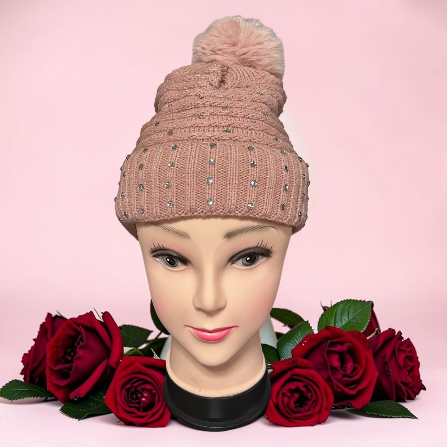 Beanie sparkling rhinestone faux fur pom-pom on top.