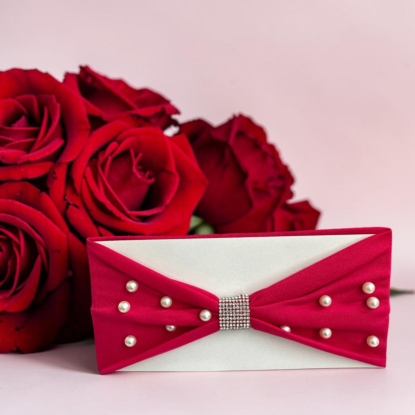 Headbands designed with a center rhinestone and scattered faux pearls.