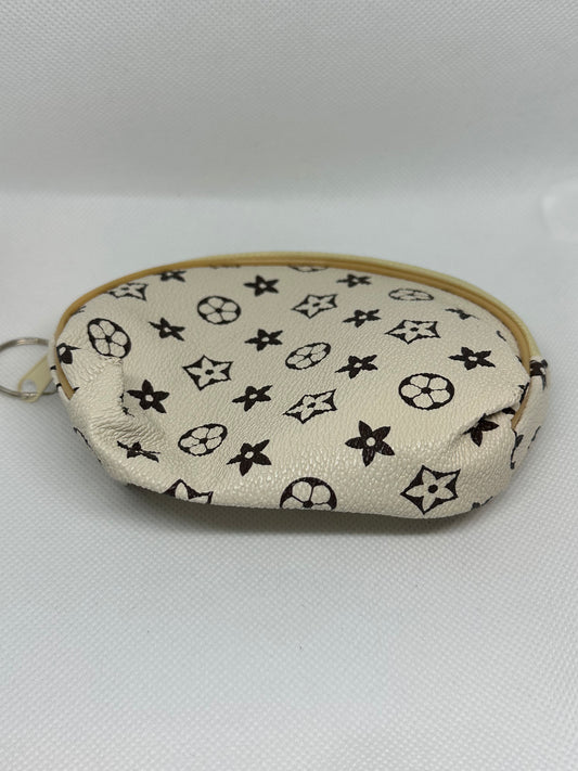Coin inspired pouch