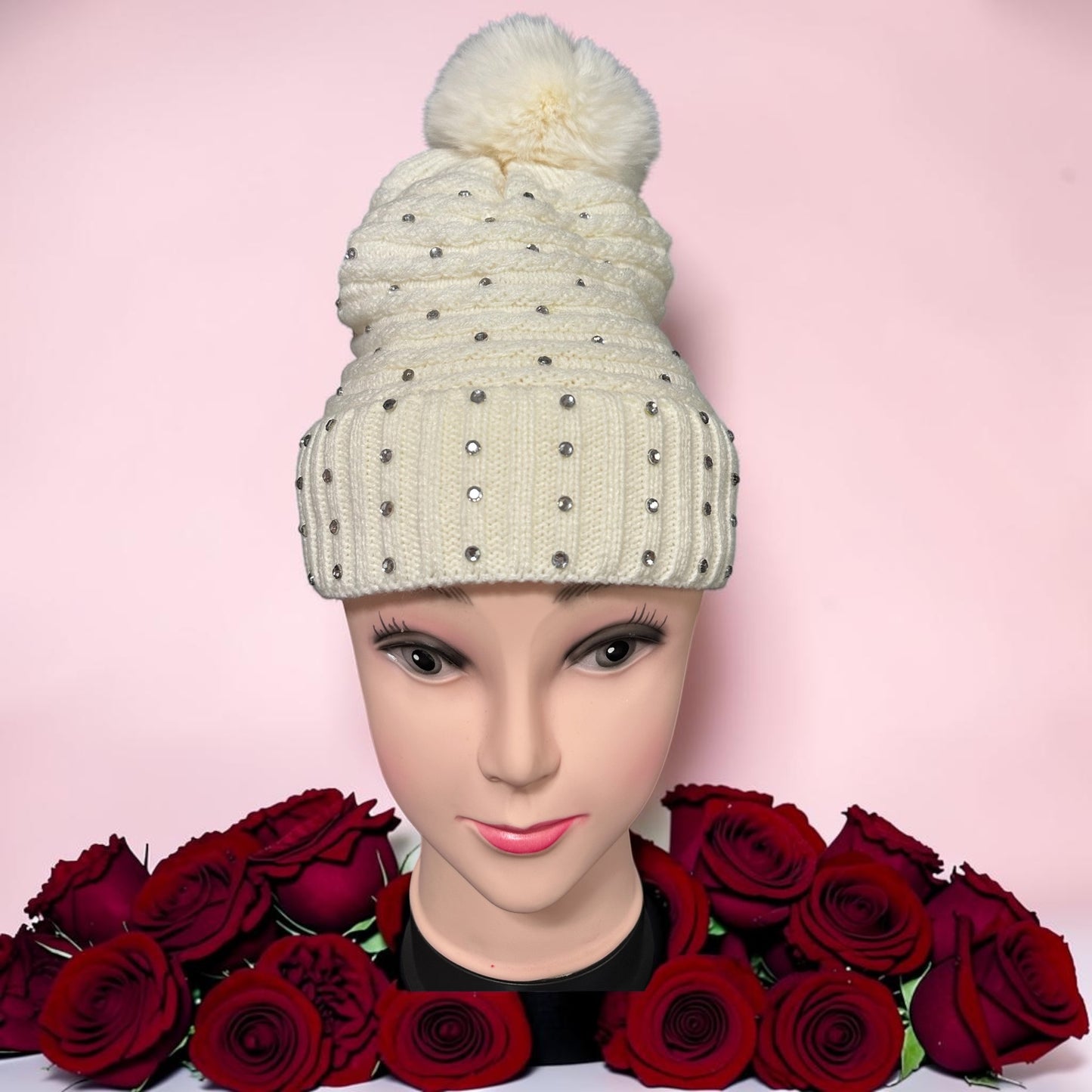 Beanie sparkling rhinestone faux fur pom-pom on top.