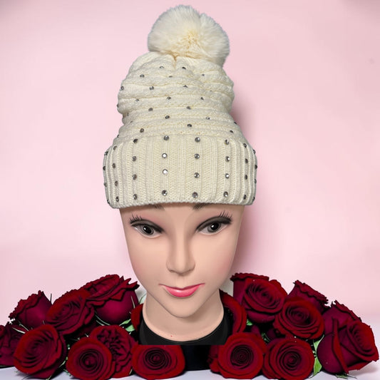 Beanie sparkling rhinestone faux fur pom-pom on top.